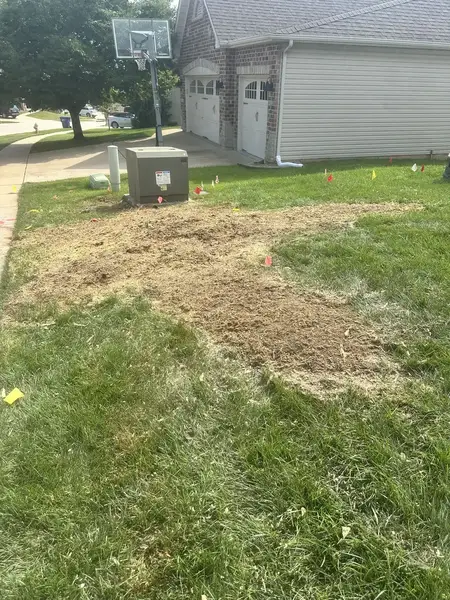 Ground-out area by a utility box