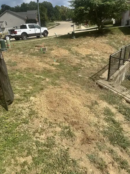 Ground-out strip along a fence